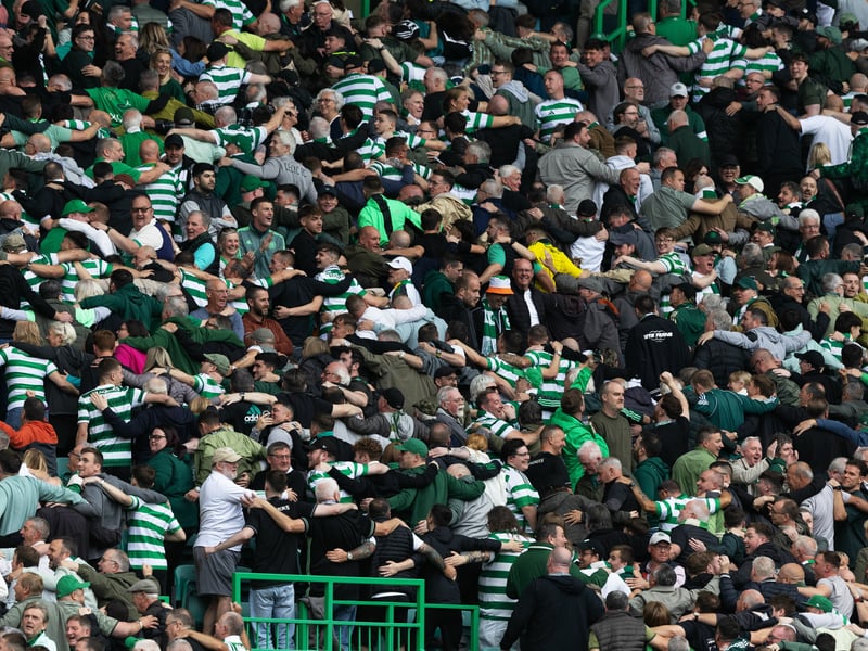 Celtic fans celebrate going 3-0 up.