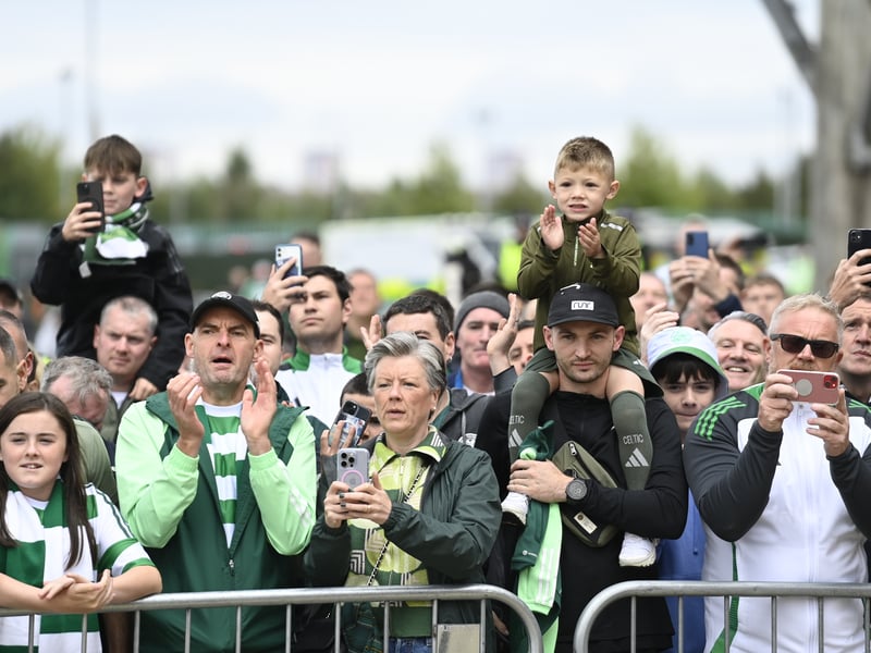 Celtic fans wait on the team bus arriving.