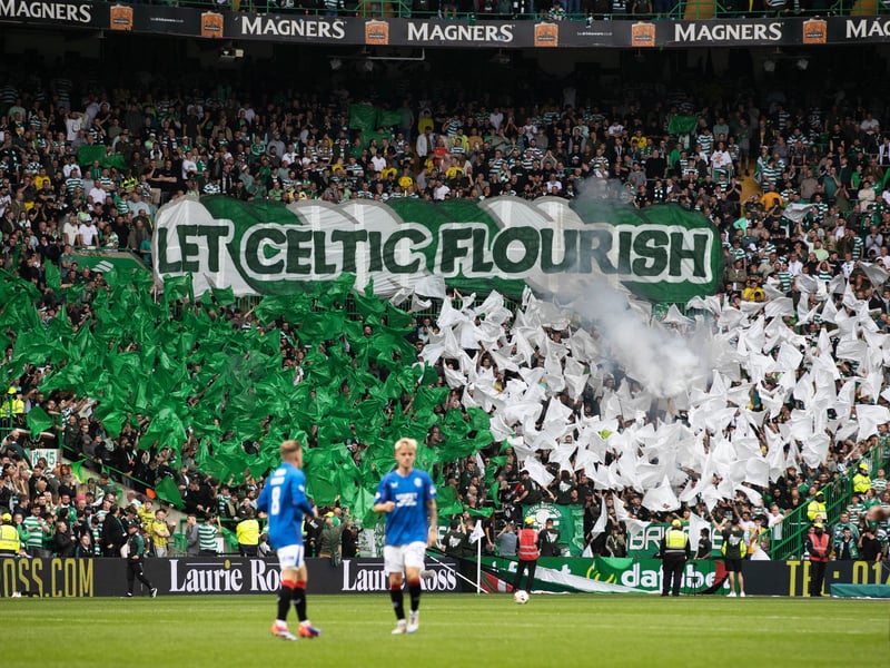 Supporters raise a banner during the clash with Rangers.