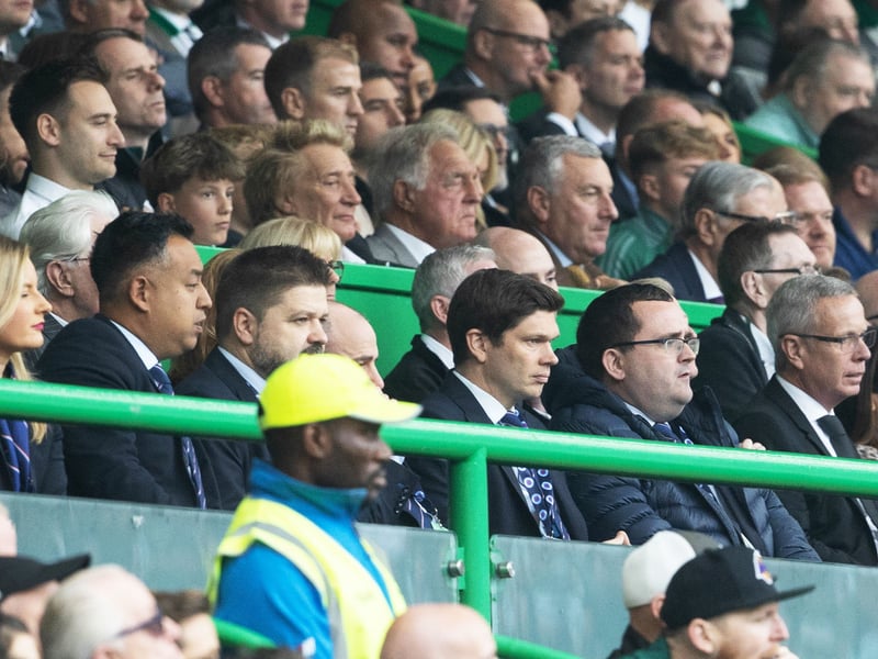 Rod Stewart and other famous Celtic fans watch on, while Rangers director of football recruitment Nils Koppen and Director of Football Operations Craig Robertson fume.