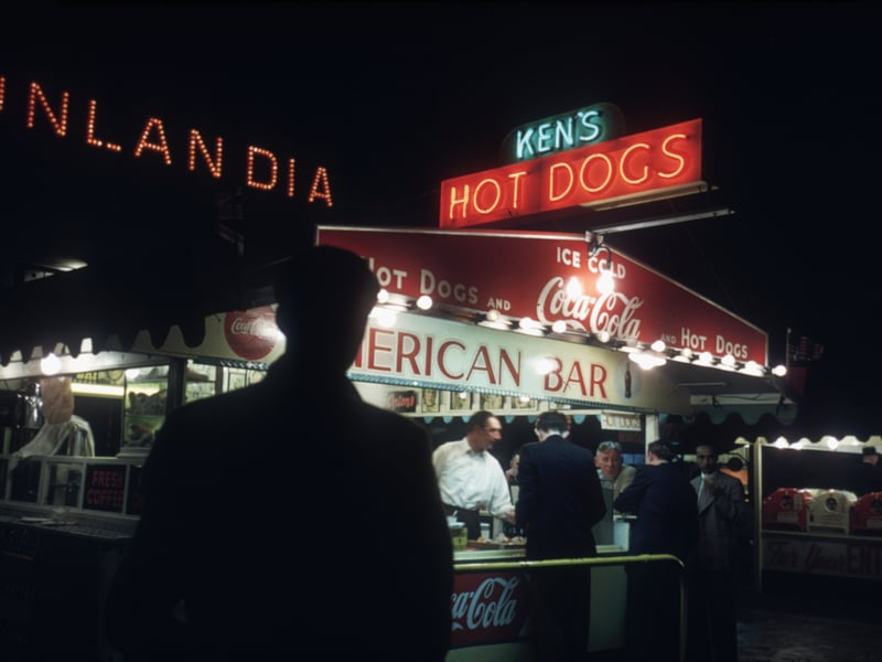 A shadowy customer approaches Ken's Hot Dogs stand in Blackpool