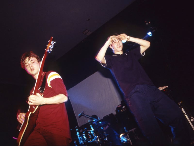 The Bluetones perform on stage, supporting Suede, Blackpool, United Kingdom, 1995. Adam Devlin guitar and Mark Morris vocals