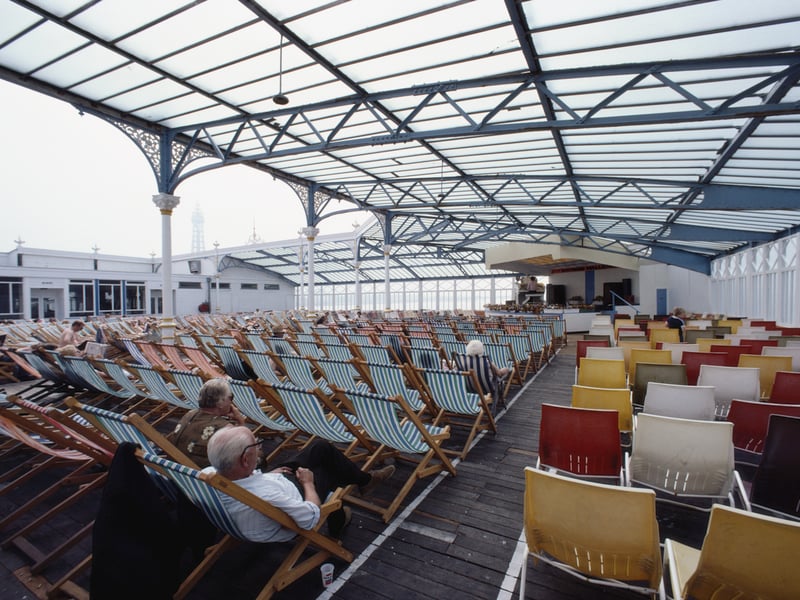 Elderly holidaymakers enjoy a sparsely attended musical performance in the seaside town of Blackpool, Lancashire, August 1983