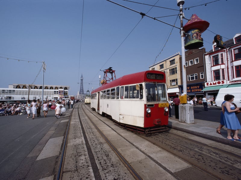 A tram makes it way along the seafront of the seaside resort of Blackpool, Lancashire, August 1983