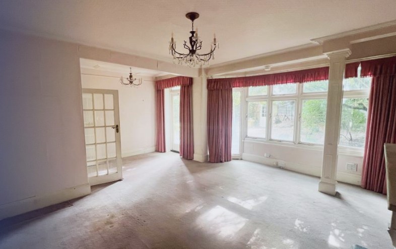 This home is in need of upgrading and refurbishment - but it has incredible bones and fantastic potential to be a beautiful home.