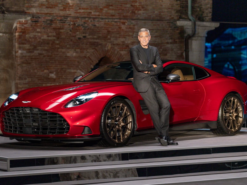George Clooney looking relaxed in Venice with Aston Martin's flagship new model.