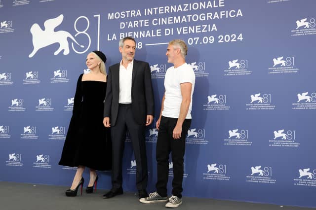 VENICE, ITALY - SEPTEMBER 04: Lady Gaga, Director Todd Phillips and Joaquin Phoenix attend the "Joker: Folie A Deux" photocall during the 81st Venice International Film Festival at Palazzo del Casino on September 04, 2024 in Venice, Italy. (Photo by Vittorio Zunino Celotto/Getty Images)