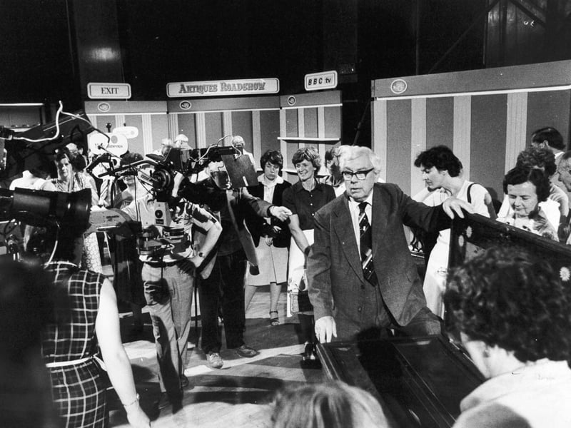 July 1982 and TV's Antiques Roadshow was in Harrogate. Pictured is antiques aficionado Arthur Negus... as expert at handling people as he is at handling the past's treasures.
