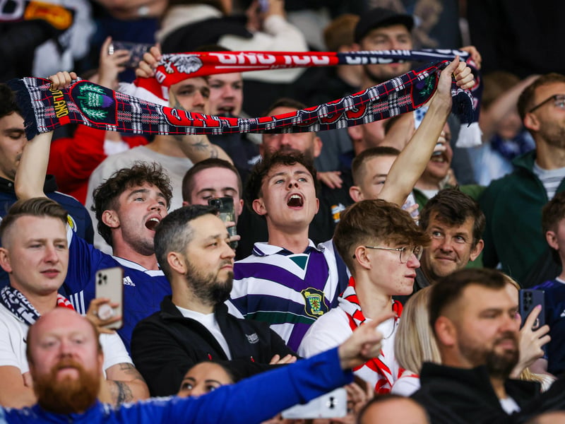 The Tartan Army belt out the national anthem.