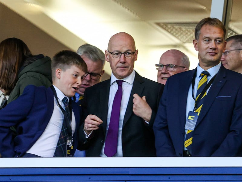 First Minister of Scotland John Swinney and Managing director of the Scottish Football Association Ian Maxwell get ready for kick off.