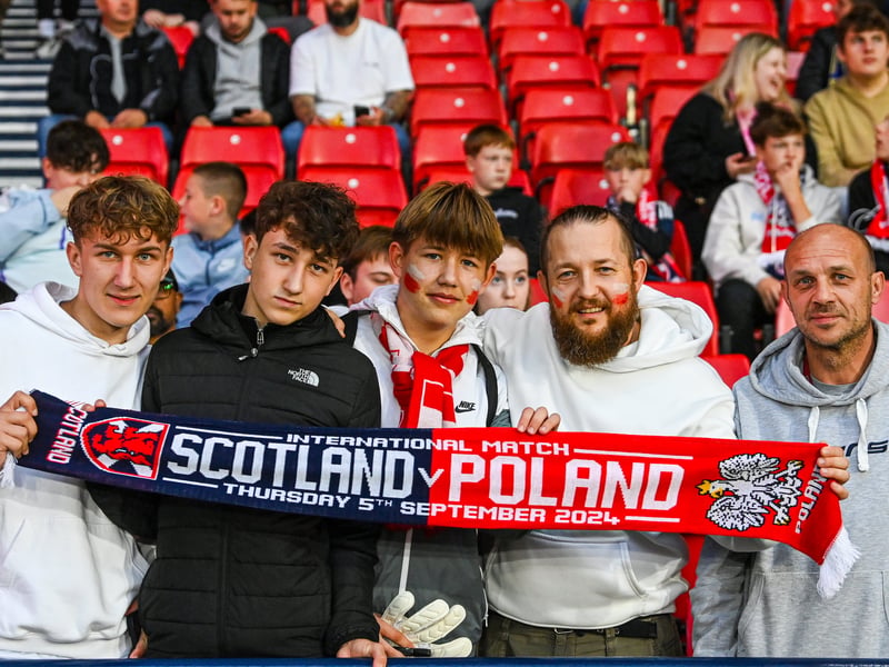 Fans with a half and half scarf during the Nations League game.