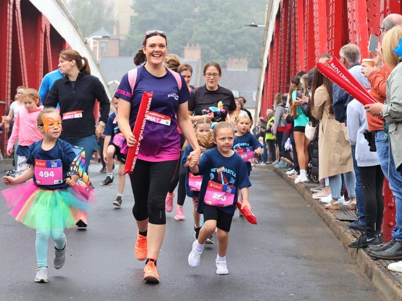 Spectators lined Newcastle's Swing Bridge to cheer on youngsters taking part in the Mini Great North Run.
