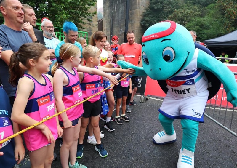 Tyney, the mascot, was on hand to help the youngsters warm up.