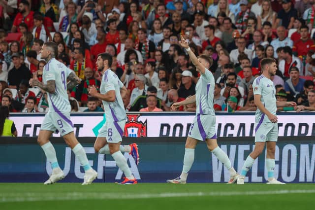 Scotland's Scott McTominay celebrates scoring against Portugal. (Photo by Carlos Rodrigues/Getty Images)