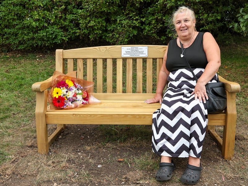 Ian Lamb's mother, Sharon Hughes, sits on the bench dedicated to her son.
Picture: Chris Moorhouse (140824-27)