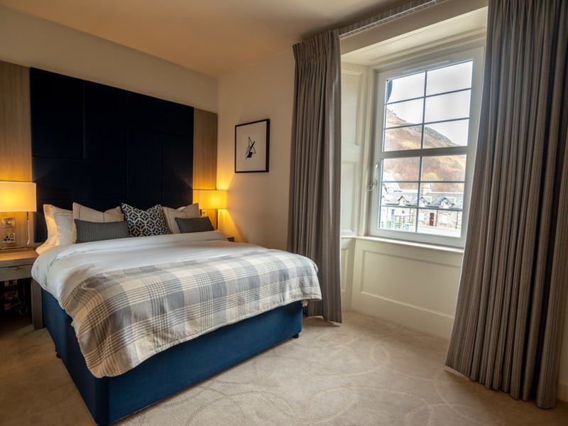 Another view of a bedrooms.