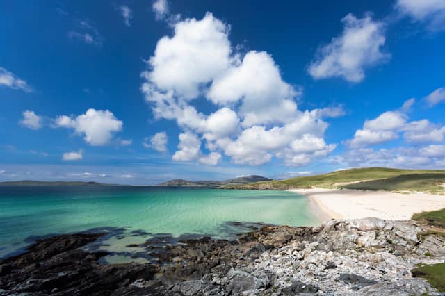 On the west coast of South Harris in the Outer Hebrides, the white sands of Luskentyre Beach ripple down to deep aquamarine waters - imparting a feeling of being in a completely different country.