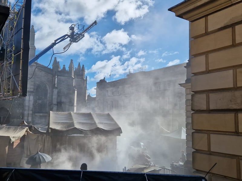 Production equipment can be seen during filming in Edinburgh