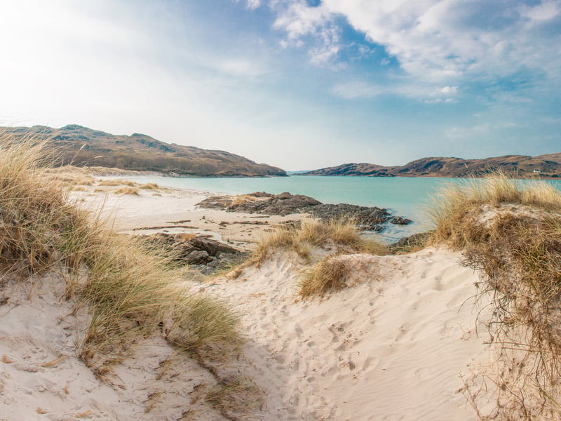 Along the West Coast and north of Fort William, Morar Beaches famously boast clear turquoise waters and silver sands with shallow waters enough for a causal paddle.