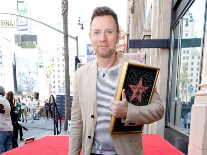 McGregor with the plaque in recognition of the honour of receiving a star on the famous Hollywood street.