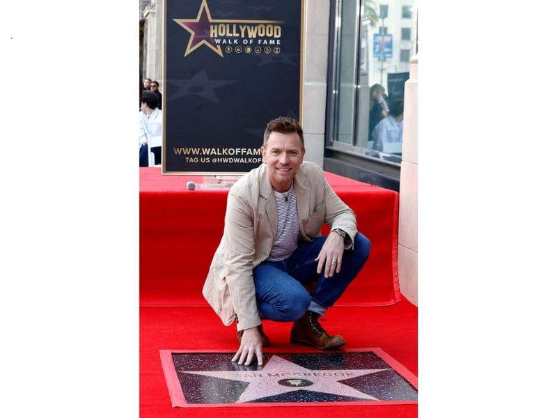 The Trainspotting actor gets up close and personal with the star on the Hollywood Walk of Fame.