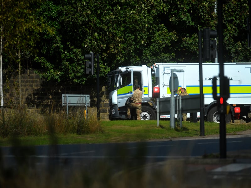 A Bomb Disposal van waiting at the scene.
