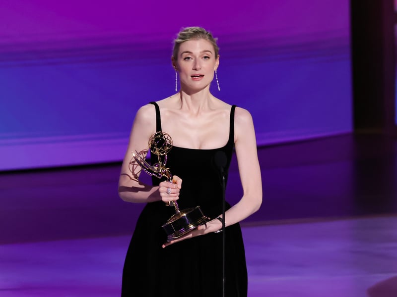 Elizabeth Debicki accepts the Outstanding Supporting Actress in a Drama Series award for The Crown onstage during the 76th Primetime Emmy Awards.