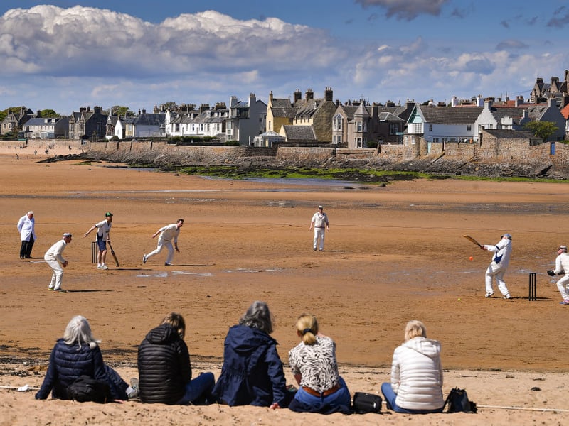 The linked villages of Elie and Earlsferry are the most expensive place on Scotland's coast to buy a house. Located in the pretty East Neuk of Fife, the village has an average property price of £869,459. A popular spot for second home owners, the village has everything you need for a holiday - with two golf courses, several sandy beaches, a sports club, water sports centre and even a sauna. The Ship Inn pub hosts a series of beach cricket matches (pictured) over the summer months.