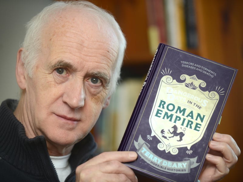 Terry Deary with his latest book, Dangerous Days in the Roman Empire, in 2013. AI said he was a 'children’s author (Horrible Histories), with huge educational and cultural reach'.