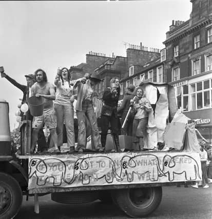 Edinburgh University students hold their annual Charities Week procession along Princes Street in May 1971.