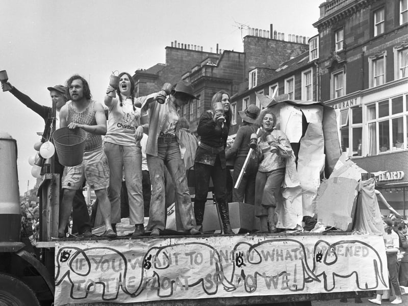 Edinburgh University students hold their annual Charities Week procession along Princes Street in May 1971.