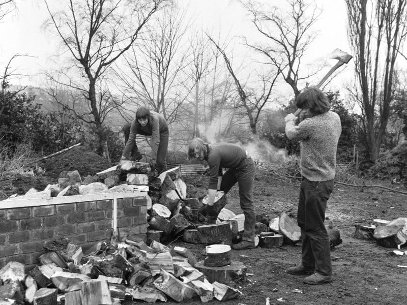 Edinburgh University students and helpers at Inverleith Park chopping logs for old people's firewood during the power cuts caused by the miners' strike in February 1972.