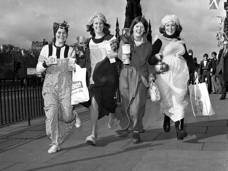 Four students in fancy dress collecting money in Princes Street for the Evening News/Edinburgh Students' Charities Appeal in May 1977.