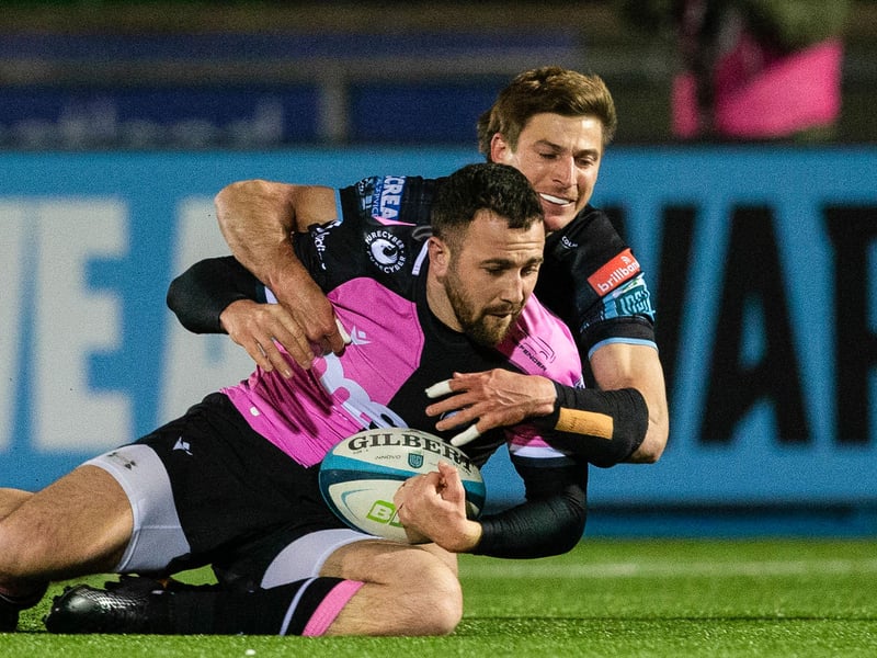 The Welsh capital club finished 12th last season with four wins yielding 32 points but the supercomputer predicts they will be one place and two points worse off this time around despite winning a game more. Cardiff's Aled Summerhill is pictured being tackled by Glasgow's Sebastian Cancelliere in a match at Scotstoun in March.