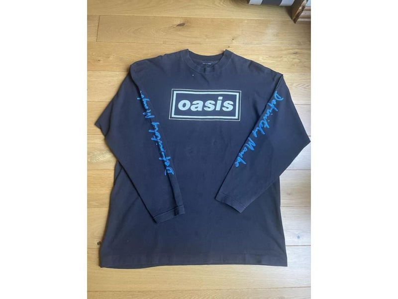This original promotional long sleeve t-shirt for Oasis' debut album Definitely Maybe went up for sale just after they announced they were reforming - no wonder it had an asking price of £999.
