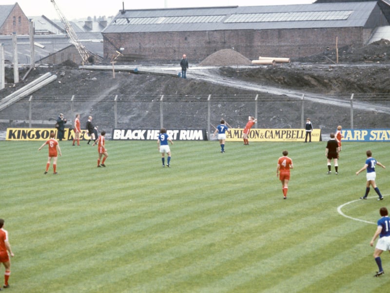 Rangers take on Aberdeen with the Govan Stand building work in the background.