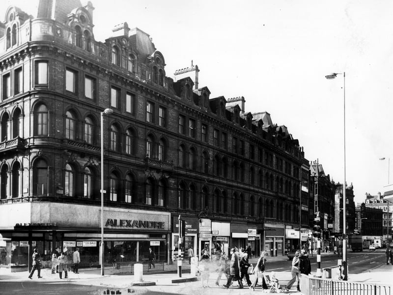Boar Lane in the mid 1970s showing, from left, Alexandre Menswear then the White Rose Restaurant John Marr jewellers, a Christian Aid gift shop and a hearing aid centre. Also in view is the temporary premises of Rawcliffe's Clothiers while their Duncan Street store was being renovated. Next is Stone-Dri Weatherwear and Finlays tobacconist at the end of the block.