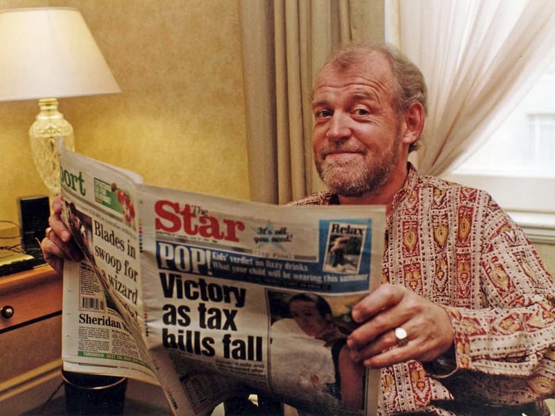 Joe Cocker with a copy of The Star in September 1994