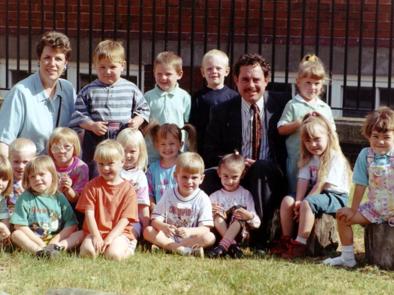 Head of Wybourn Primary School, Brian Taylor, with teacher Madeline Lawson and children in July 1994