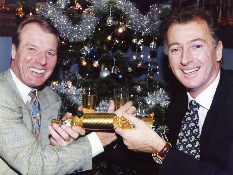 Sheffield Wednesday manager Trevor Francis and Sheffield United's Dave Bassett put their rivalry to one side as they celebrate Christmas in December 1994