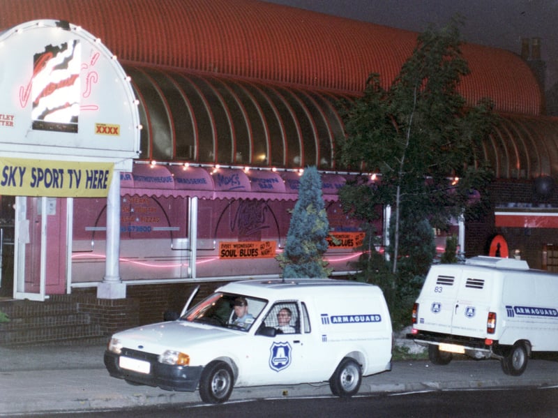 The scene outside Napoleon's Casino Club, Ecclesall Road, Sheffield, on August 18, 1994, after armed robbers crashed their car into this security van and made off with takings from the casino