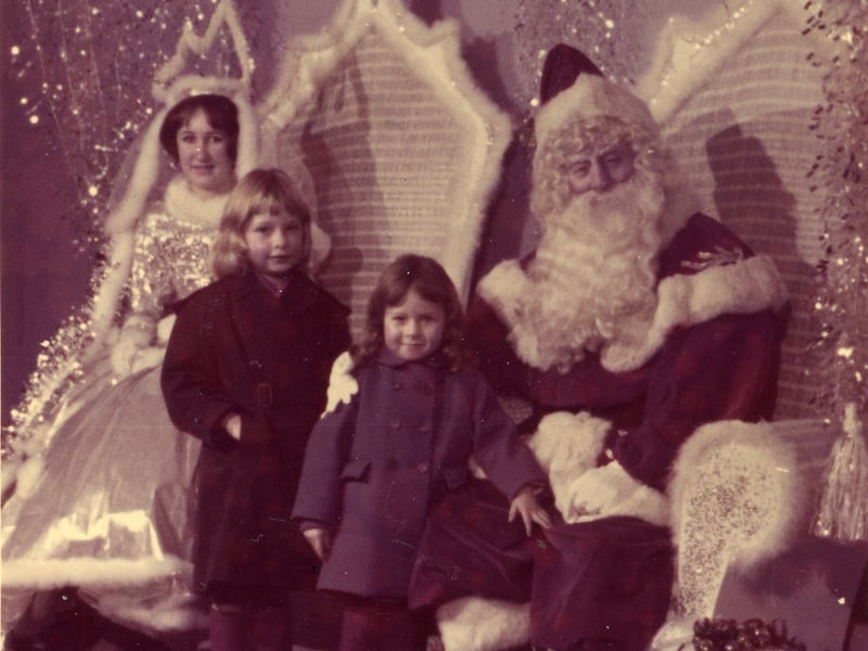 A visit to Father Christmas at Lewis's department store , Blackpool in 1964 for Heather Brown (six) and her younger sister Lyndsey (four)