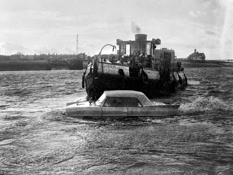 American designed, combined car and boat, the Amphicar, in it's first North of England sea trials off Knott End in 1964
