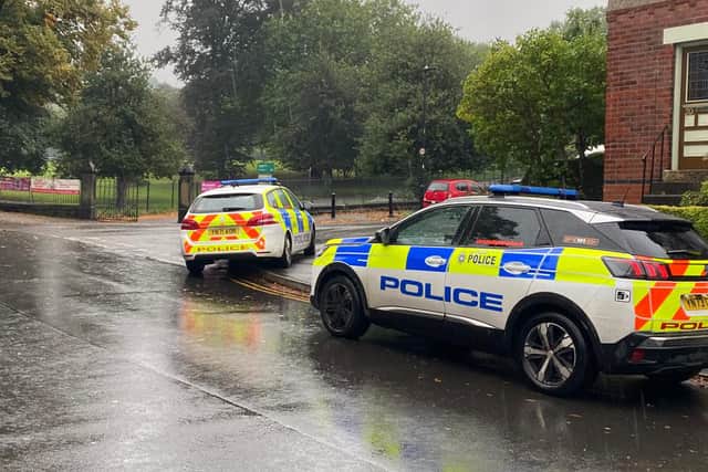 Police cars outside Meersbrook Park on Sunday afternoon