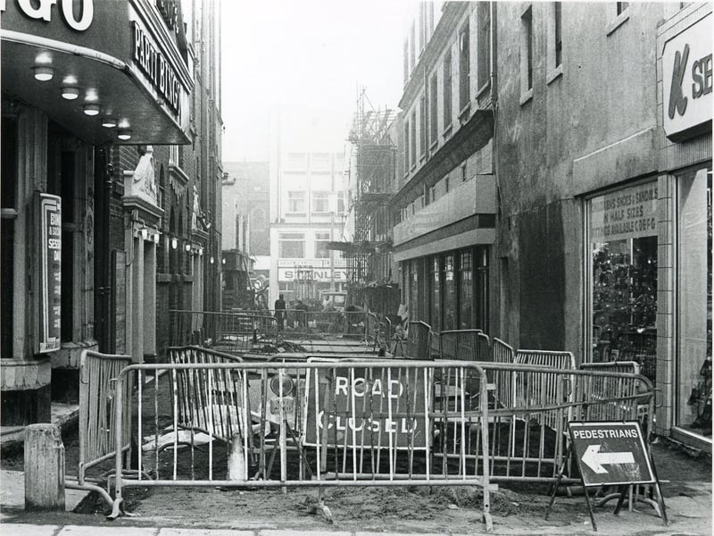 Pedestrianisation under way at the southern end of Corporation Street looking towards Victoria Street with the Grand Theatre on the left, K shoes on the right.The Stanley Cafe in the distance on Victoria Street