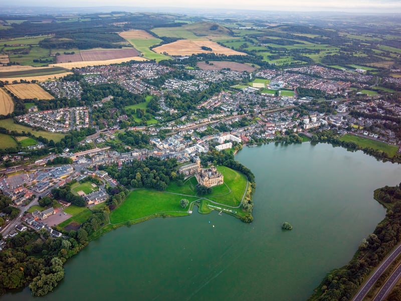 Linlithgow Palace, the holiday home of the once great Stuart dynasty, presides over the loch as the town looks on.