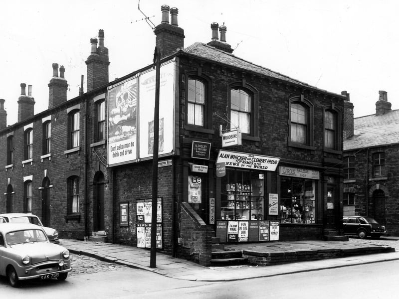  Hartington Road runs from the left edge of the view. Moving right, number 77 Tong Road is a newsagents and greengrocers with the names A. Lolley and F. Moore above the door. Pictured in May 1965.
