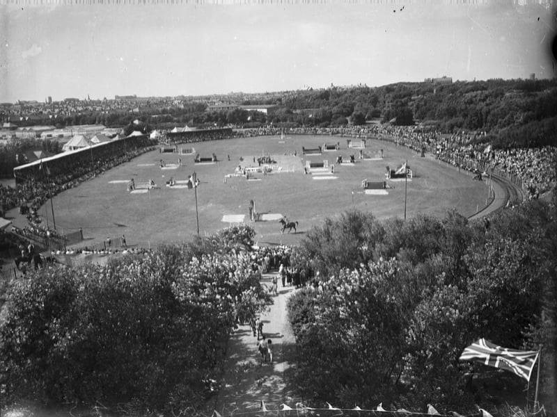 The Royal Lancashire Show visited Stanley Park in 1949. The athletics ground (seen here from the top of the Cocker Memorial ) was used for some of the exhibits and judging, here the show jumping is in progress