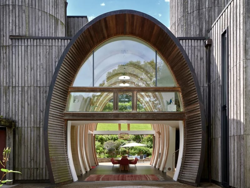 The listing says: "Located in a hidden valley, in the South Downs National Park, a truly exceptional family home and the winner of many distinguished architectural awards."