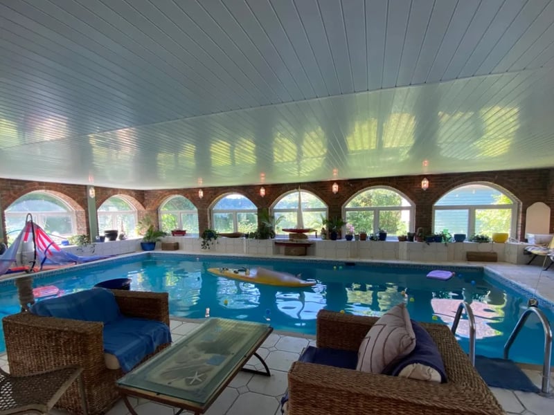 The listing says: "A wonderful Family Home to the current owners for 25 years, the Georgian facade reveals exposed beams, oak panelling, vast feature open fireplaces and light airy rooms. The Ground Floor has four entertaining rooms plus a study." 